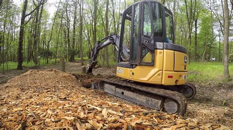 stump removal with mini excavator|digging stumps with mini excavator.